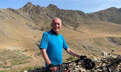 John Homer Cycling on the  tour with redspokes